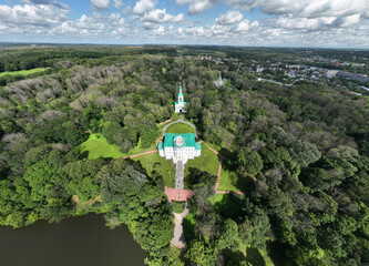 panoramic view of the white old stone manor on the shore of the lake and with the park in the city of Bogoroditsk