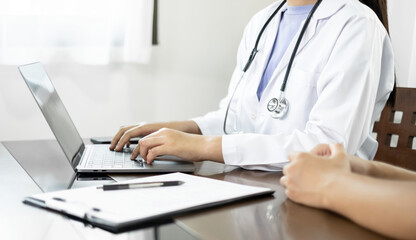 Female doctors who treat patients make an appointment to listen to the results after a physical...