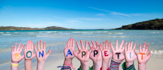 Children Hands Building Word Bon Appetit, Ocean And Sea - obrazy, fototapety, plakaty
