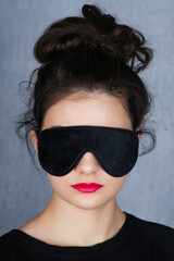 Gorgeous woman with black sleep mask - Image