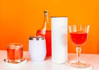 With a touch of sophistication, a mockup image presents a white blank tumbler arranged with a wine-themed flair