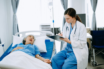 Obraz premium Woman Doctor and patient discussing something while sitting on examination bed in modern clinic or hospital . Medicine and health care concept.
