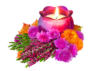 Autumn and natural decoration with heather, asters, candle and leaves isolated on white background