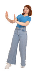 Woman hands show stop symbol, full body length young red hair 20s woman hands show stop symbol....