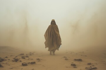 mysterious figure in striking cloak walking through sandstorm in desolate desert