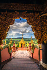 Fototapeta premium Landmark Sunrise with sky at Wat Phra That Doi Phra Chan on the top hill of Doi Phra Chan mountain in Mae Tha, Lampang province, Thailand