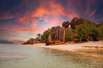 picturesque bright nature in Seychelles, granite stones on Anse de Source d’Argent beach, epic sunset