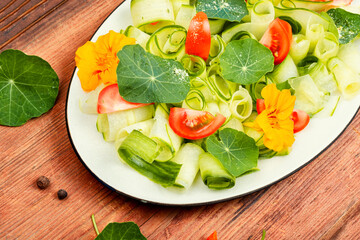 Fresh summer salad with flowers nasturtium