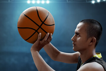 Asian male basketball player shooting a ball - 626852432