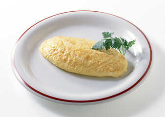 Omu-raisu on White background with clipping path. Popular Japanese foods.