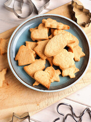 Tasty organic Christmas cookies on a wooden kitchen table