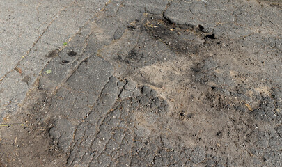 A damaged road dangerous for traffic