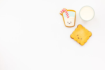 Brekfast with milk and funny cookies, top view. Food for kids