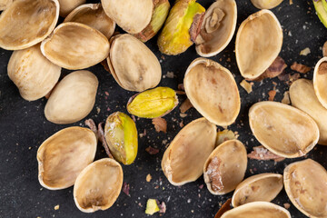 Fototapeta premium a large number of salty and crispy pistachios close-up