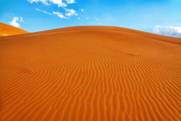 Hot deserts of the southeastern part of the Arabian Peninsula. Orange (tinged red with iron oxide)...