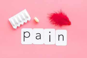 Word pain with red pen and rectal suppositories. Treatment concept
