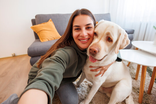 Woman Taking A Selfie With Her Dog