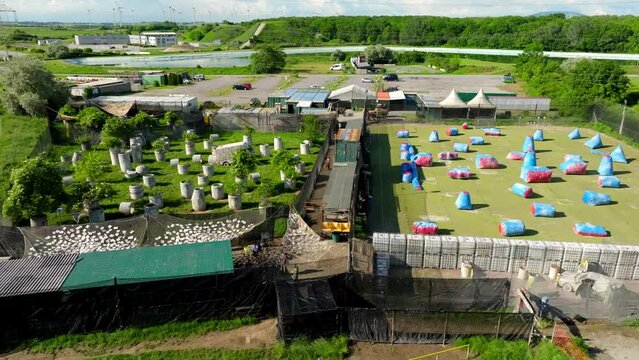 Aerial View Of Paintball Field With Variety Of Obstacles In Summer. 