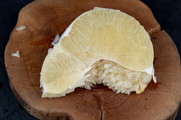 cut into pieces of ripe juicy yellow pomelo