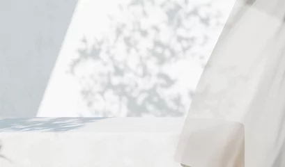 Photo sur Plexiglas Papier peint en béton White concrete empty table, organic curtain and plant shadow on cement wall. Summer exterior scene for product placement mockup. Neutral minimal aesthetic.