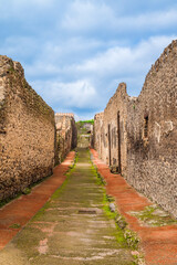 Narrow lanes at Pompeii ruins deteriorated