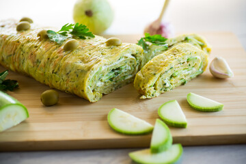 vegetable zucchini roll with garlic cheese filling inside.