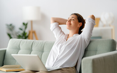 woman working on laptop at home