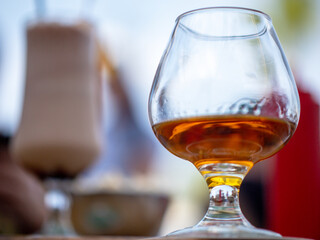Whiskey glass on the background blurred