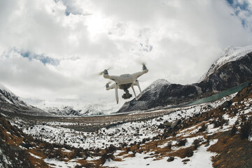 Flying drone taking picture of landscape in Tibet, China