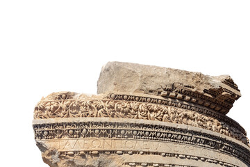 Upper part of ancient monument in old Antalya with floral ornament and fragment of inscription...