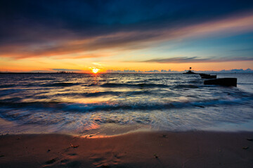 Amazing sunset on the beach at Baltic Sea in Gdansk, Poland