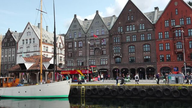 Bergen, Norway - June 30, 2023: Hanseatic heritage wooden buildings in the city of Bergen included on UNESCO's World Heritage List. Bergen is the second-largest city in Norway.