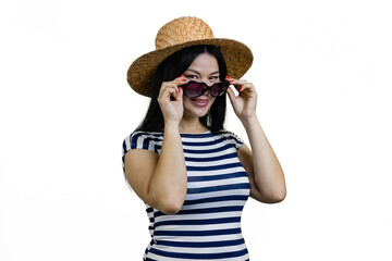 Young asian woman in straw hat is wearing sunglasses. Isolated on white.