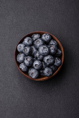 Delicious fresh sweet blueberries in a ceramic bowl. Vegan food