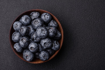 Delicious fresh sweet blueberries in a ceramic bowl. Vegan food