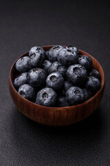 Delicious fresh sweet blueberries in a ceramic bowl. Vegan food