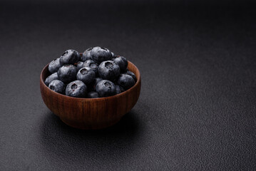 Delicious fresh sweet blueberries in a ceramic bowl. Vegan food