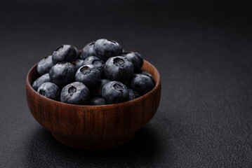 Delicious fresh sweet blueberries in a ceramic bowl. Vegan food