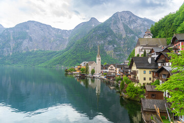 Fototapeta na wymiar A Beautiful Lakeside View with Stunning Mountain Scenery and Historic Buildings. Captivating Hallstatt: A Picturesque Journey to a World Heritage Gem.