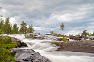 Scenic Cascade in Swedish Wilderness Turbulent Water Rushing Through Pite River