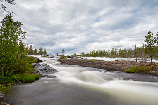Cloud summer day at Trollforsen in Pite river, Sweden