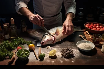 Foto op Canvas A chef, viewed from behind, expertly filleting a fish with a sharp knife, with various sauces and garnishes on a nearby countertop. Generative AI © Maksym