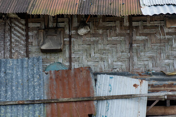 Old rusty zinc fence wall surface grunge, vintage style metal sheet roof for texture and background in retro concept