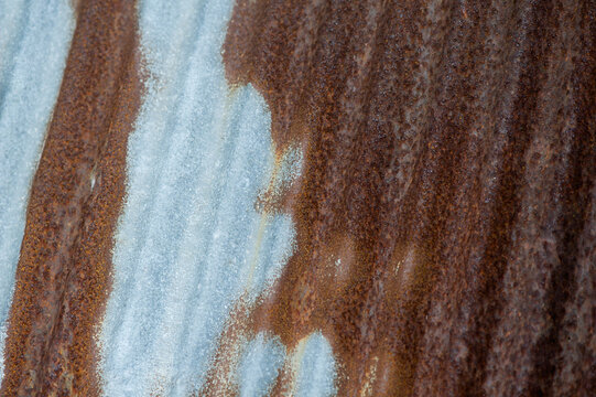 Old rusty zinc fence wall surface grunge, vintage style metal sheet roof for texture and background in retro concept