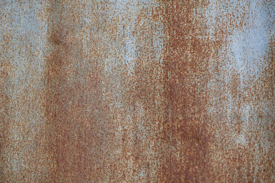 Old rusty zinc fence wall surface grunge, vintage style metal sheet roof for texture and background in retro concept