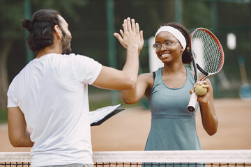 Two tennis players with rackets in hands before the match