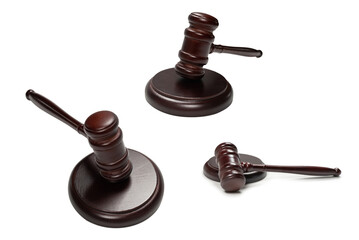 Wooden judge gavel and soundboard isolated on a white background.