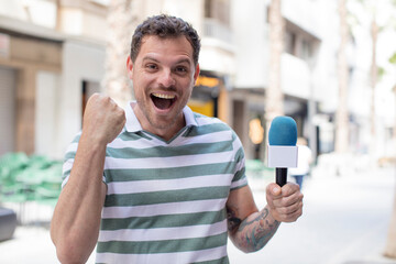 feeling shocked,laughing and celebrating success. presenter concept