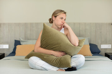Obraz premium feeling bored, frustrated and sleepy after a tiresome. pajamas or night wear concept