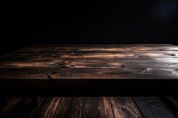 wooden table with space for product placement on a dark background